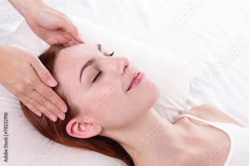 young woman enjoy face massage