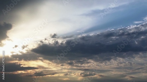 timelapse clouds in summer in blue sky with sun