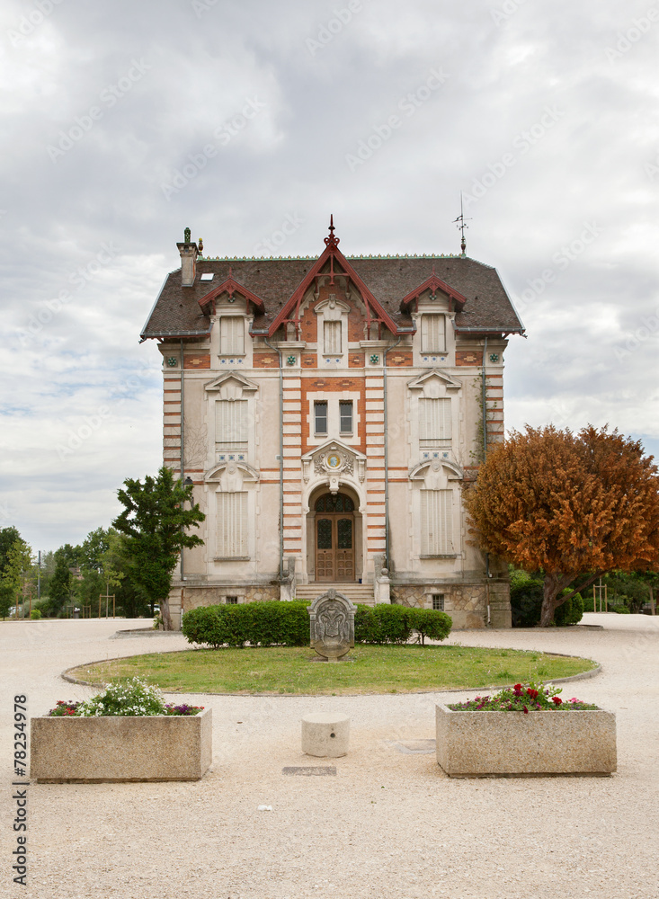 The old house in city park of L'Isle-sur-la-Sorgu