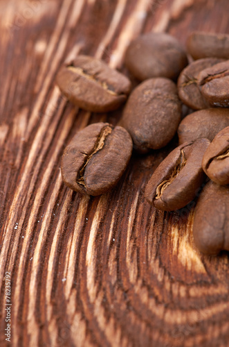 Coffee beans on wood background