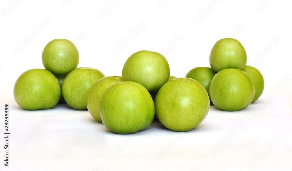 Pyramid of fresh green tomato on white background Pyramid of fresh green tomato on white background