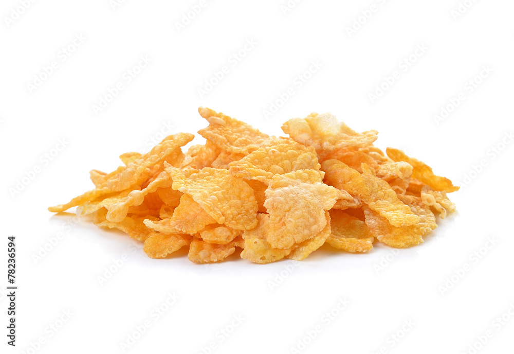 Pile of corn flakes isolated on white. Pile of corn flakes isolated on white.