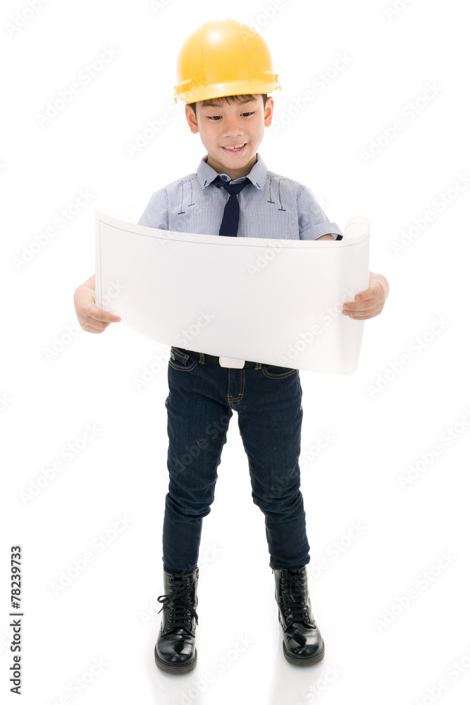 Young asian child construction engineer holding equipment Young asian child construction engineer holding equipment