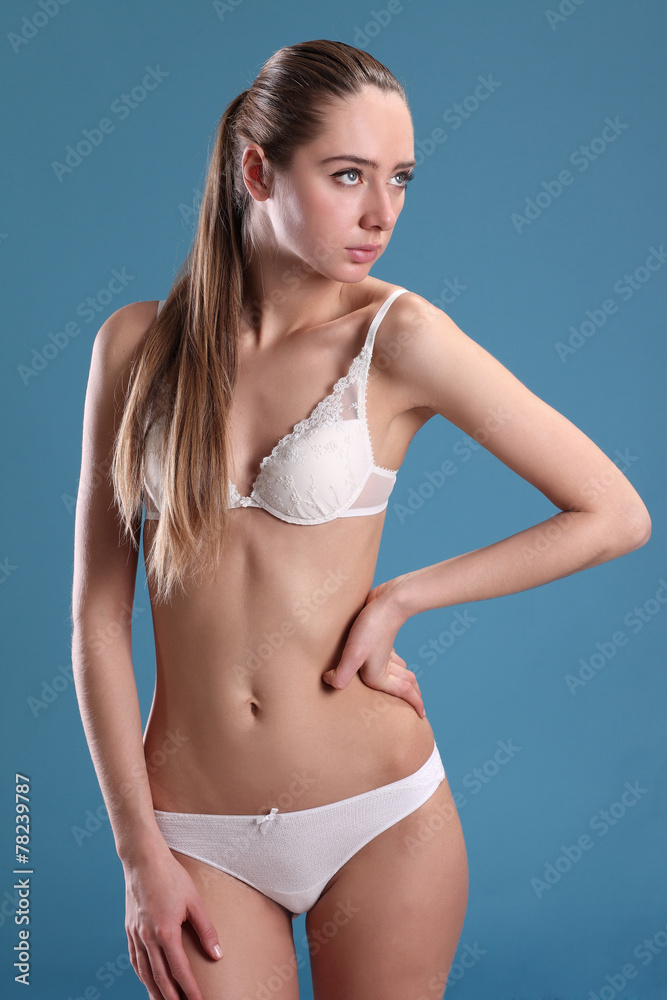 young woman stand in lingerie