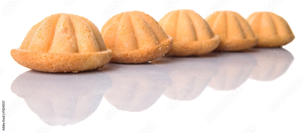 Kuih bahulu, Malay sweet egg sponge muffin cake on white Kuih bahulu, Malay sweet egg sponge muffin cake on white