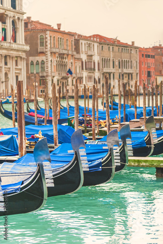 Gondolas in Venice has a background of buildings