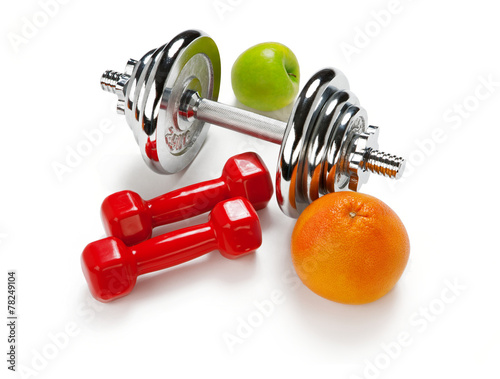 Light and Heavy dumbbells with green apple ang grapefruit