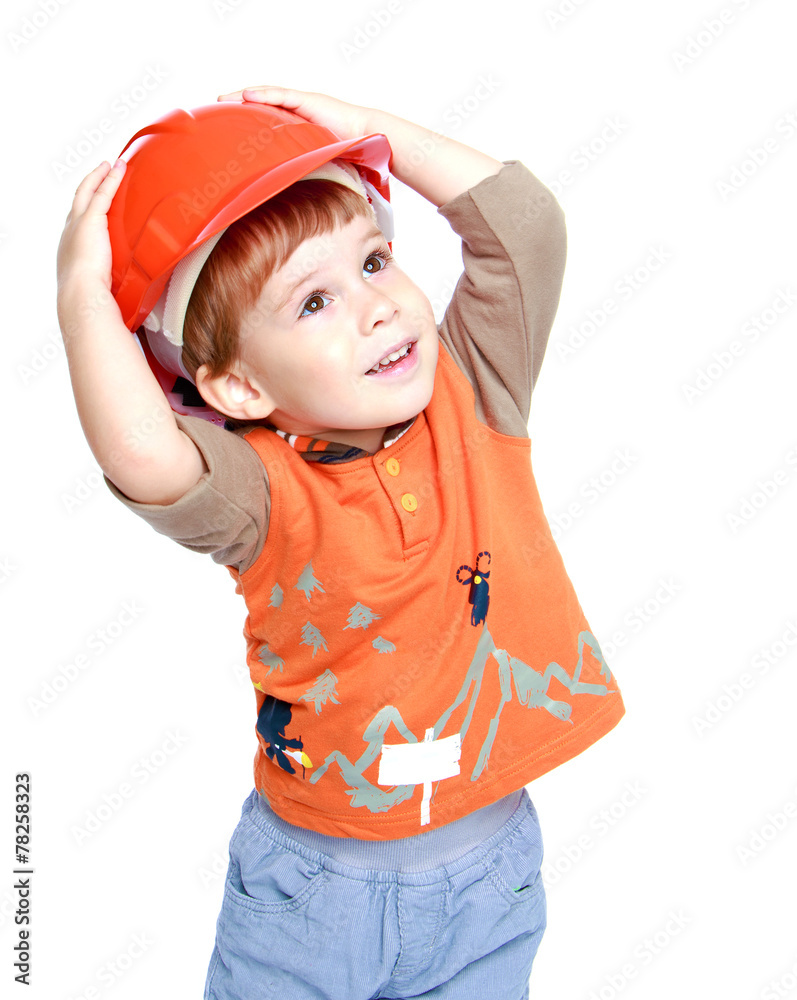 Happy little boy in the construction helmet. Happy little boy in the construction helmet.