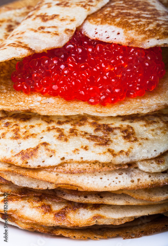 Russian pancakes - blini with red caviar