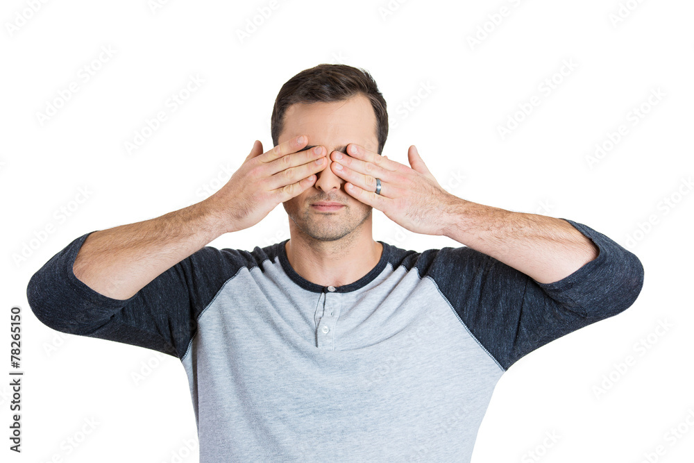 Man covering eyes with hands Man covering eyes with hands