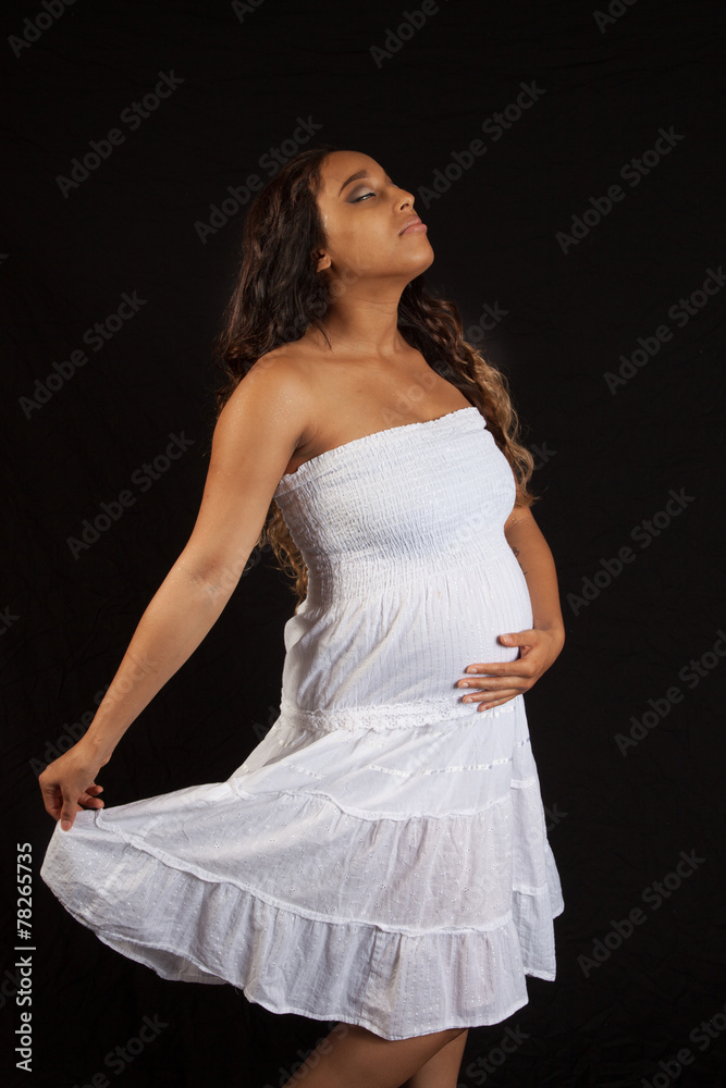 Pregnant woman in thoughtful mood