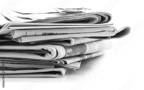 newspapers over white background