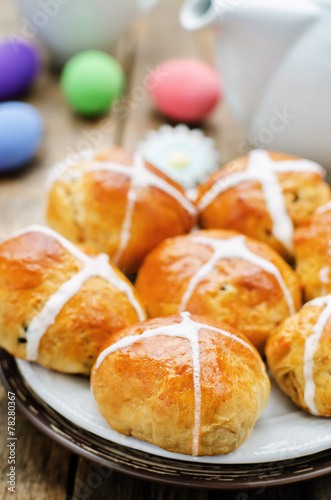 Easter buns with a cross and eggs