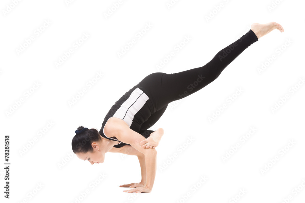 Yogi female in yoga Flying Pigeon Pose Yogi female in yoga Flying Pigeon Pose