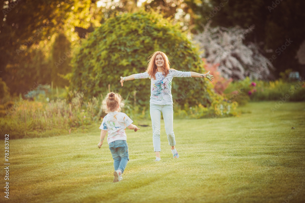 Fototapeta premium Mother and little daughter playing together