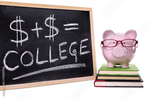 Piggy Bank or piggybank with college fund savings or fees chart written on smaill blackboard isolated on white background photo