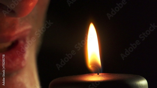 Slow motion of match and candle. Find similar in our portfolio.