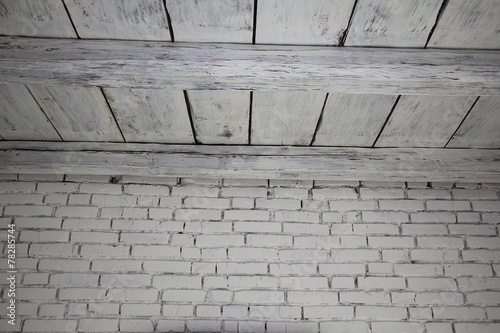 Brick wall and wooden ceiling photo