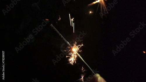 Slow motion of sparkler. Find similar in our portfolio.