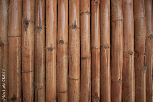 Fototapeta Naklejka Na Ścianę i Meble -  Bamboo wall background in the building. Close up bamboo wall