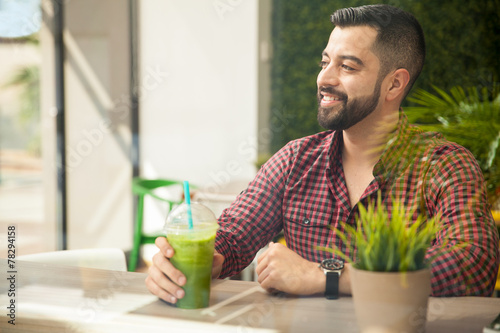 Handsome man with a smoothie