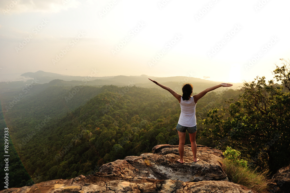 strong confident woman hiker open arms at on mountain peak rock strong confident woman hiker open arms at on mountain peak rock