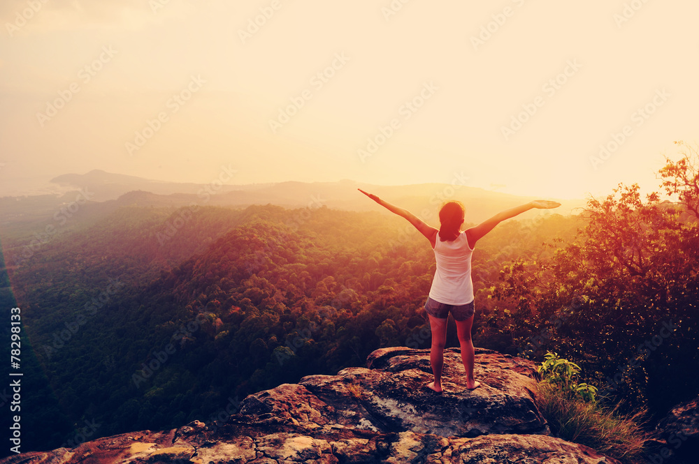 strong confident woman hiker open arms at on mountain peak rock strong confident woman hiker open arms at on mountain peak rock