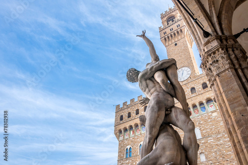Rape of the Sabines sculpture by Giambologna in Florence, Italy photo