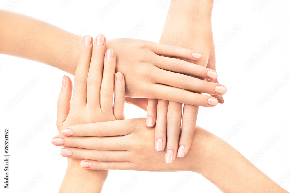 Fototapeta premium Female hands with classical french manicure on black background