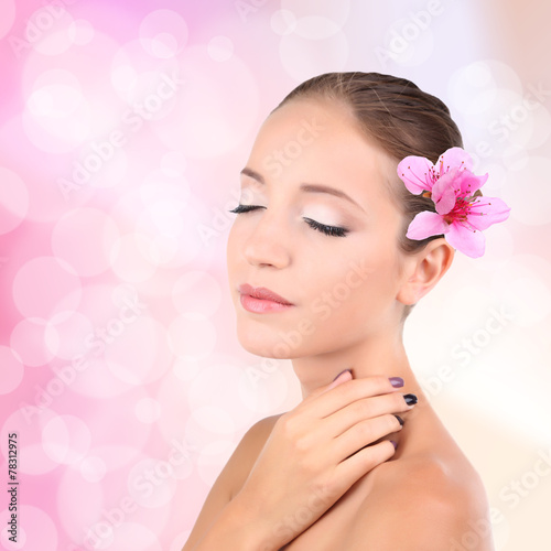 Beautiful young woman with ...