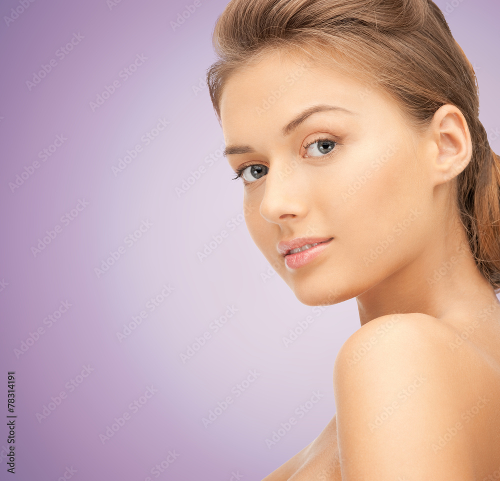 Fototapeta premium beautiful young woman with bare shoulders