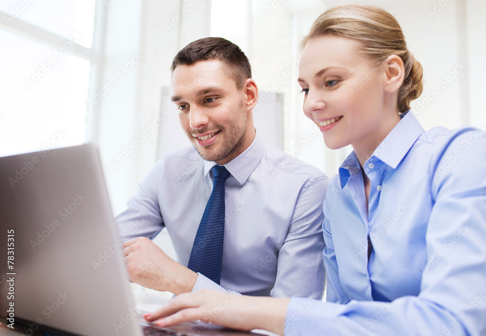 smiling businesspeople with tablet pc in office smiling businesspeople with tablet pc in office