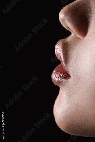 Macro side view of sensual lips and chin