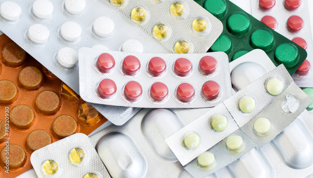 A variety of different colored pills A variety of different colored pills