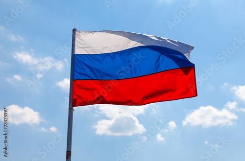Free Download Russian flag waving in the wind over blue sky - GFXLoad