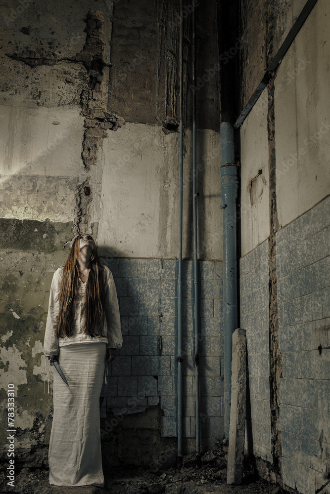 zombie girl with loong hair in an abandoned building holding kni zombie girl with loong hair in an abandoned building holding kni