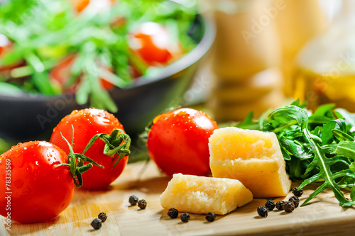 Food, tomato rucola and Parmesan salad