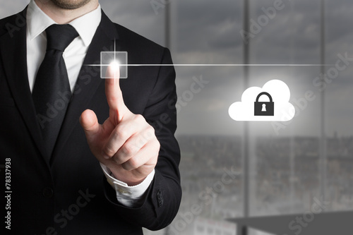 businessman pushing touchscreen button cloud security