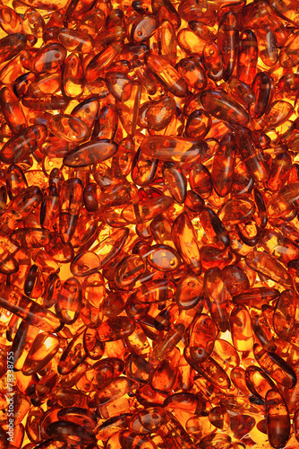amber stones rectangular closeup lie on a flat surface