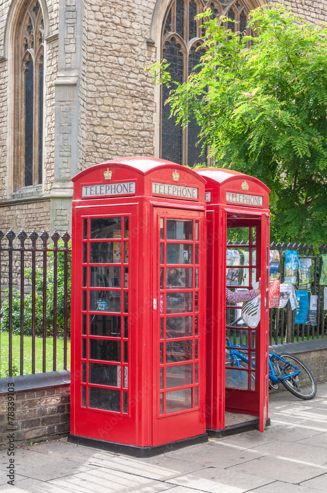 Row of two red british telephone boxes Row of two red british telephone boxes