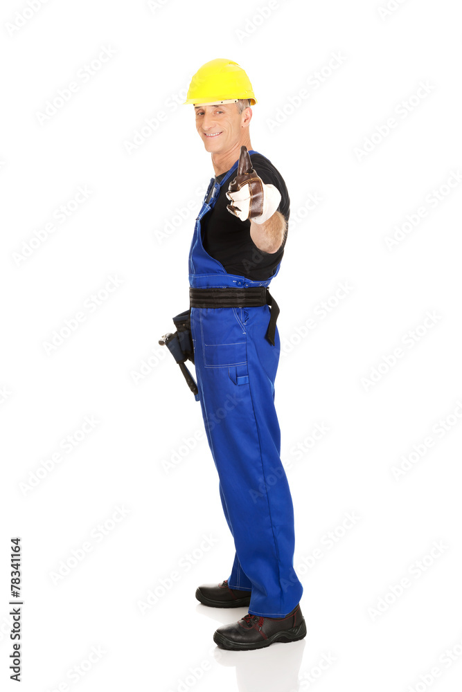 Repairman showing thumbs up