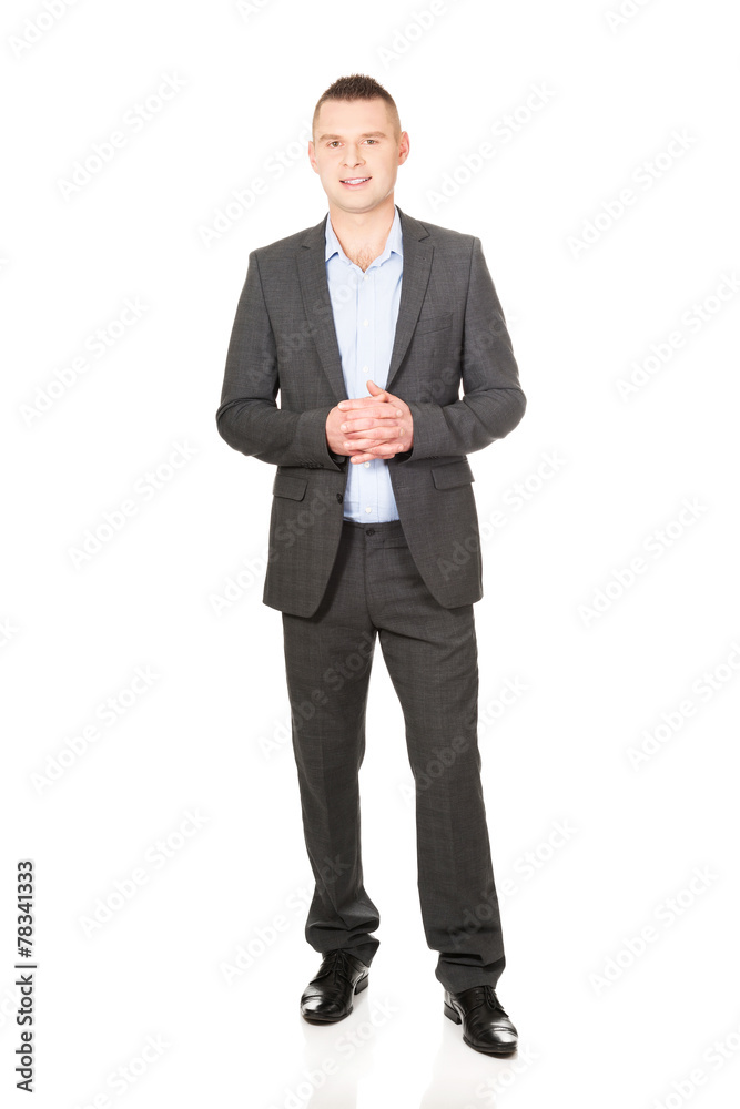 Businessman with clenched hands Businessman with clenched hands
