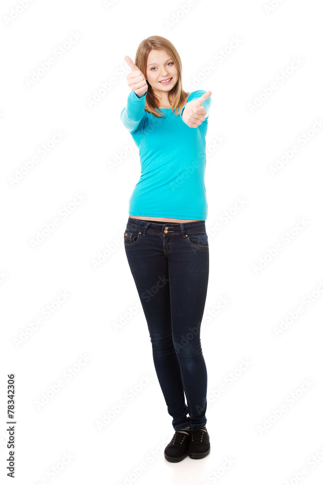 Woman showing thumbs up with both hands Woman showing thumbs up with both hands