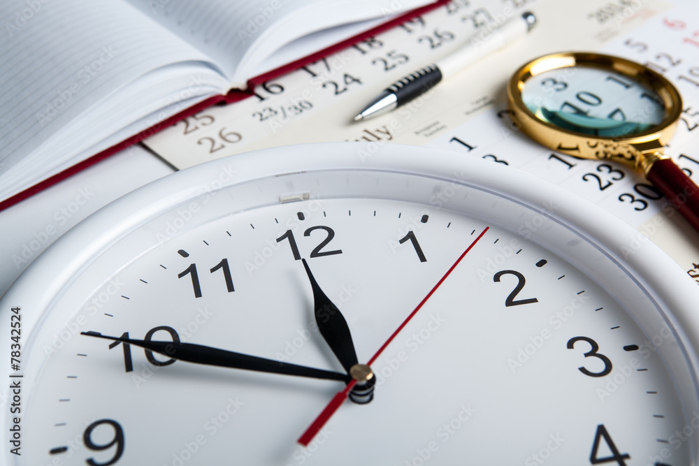 business stil life with clockface business stil life with clockface