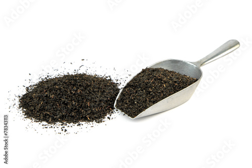 Dry black tea leaves .