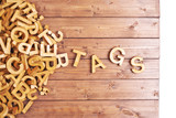 Word tags made with wooden letters