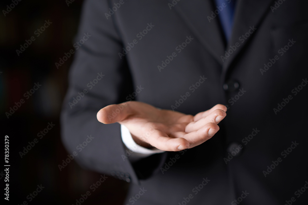 Obraz premium Fragment of a man in a business suit