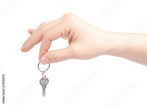 Hand holding a small key