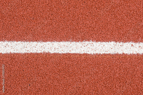 The running track rubber lanes cover texture with line for background. © tkroot