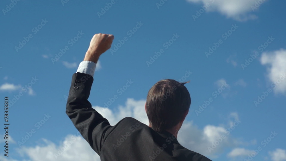 Male Businessman Back Raising Victory Arm Male Businessman Back Raising Victory Arm